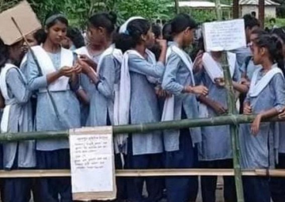 School Students blocked Sabroom-Agartala Nation Highway in Sabroom over teacher crisis